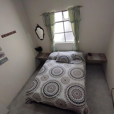 Pa Pasiar Hostal Medellín Værelse billede